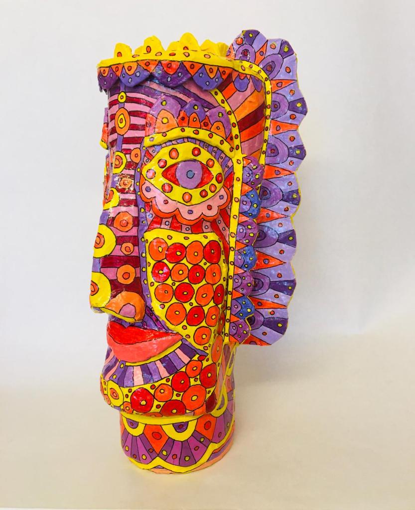 Colourful papier mache head